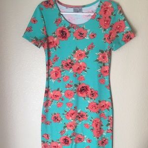 Knee length stretchy floral dress.